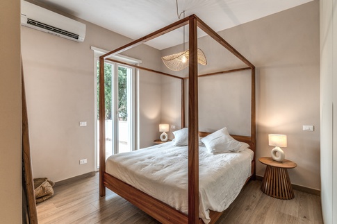 Camera da Letto in stile coloniale di 20 di MOB Architects