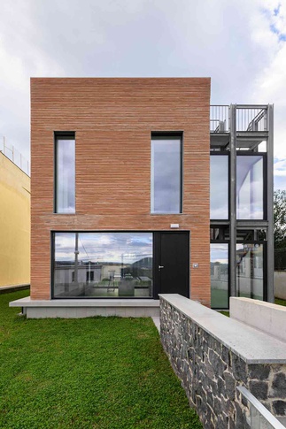 Ingresso in stile contemporaneo di 13 di MANUARINO architettura design comunicazione